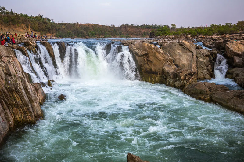 Dhuandhar Falls - Smoky cascade forms from the water hitting the rocks and Narmada River | Banasri Tourism Private Limited | banasri.in