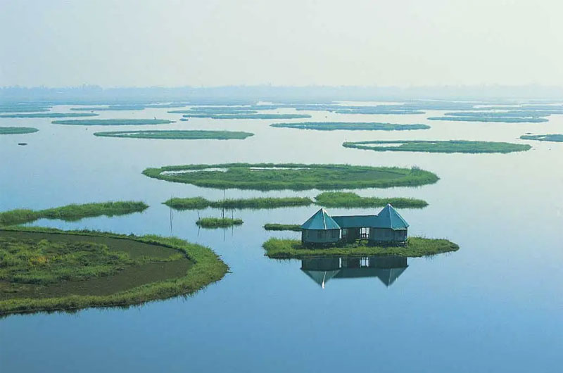 Loktak Lake in Manipur Known for its floating islands called "phumdis" | Banasri Tourism Private Limited | banasri.in