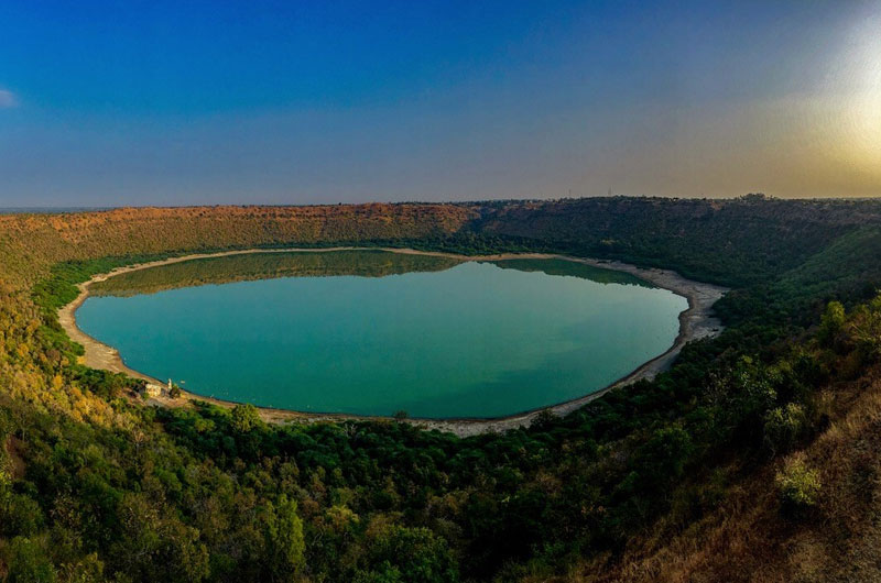 Lonar Lake is one of the few hyper-velocity impact craters in basaltic rock anywhere in the world. | Banasri Tourism Private Limited | banasri.in