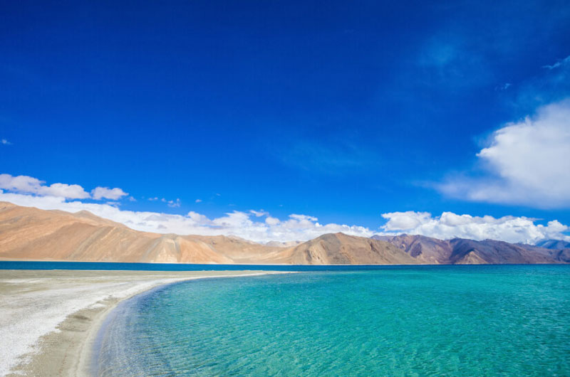 Pangong Lake is a natural lake that was formed during the last Ice Age as a result of glacial movements. | Banasri Tourism Private Limited | banasri.in